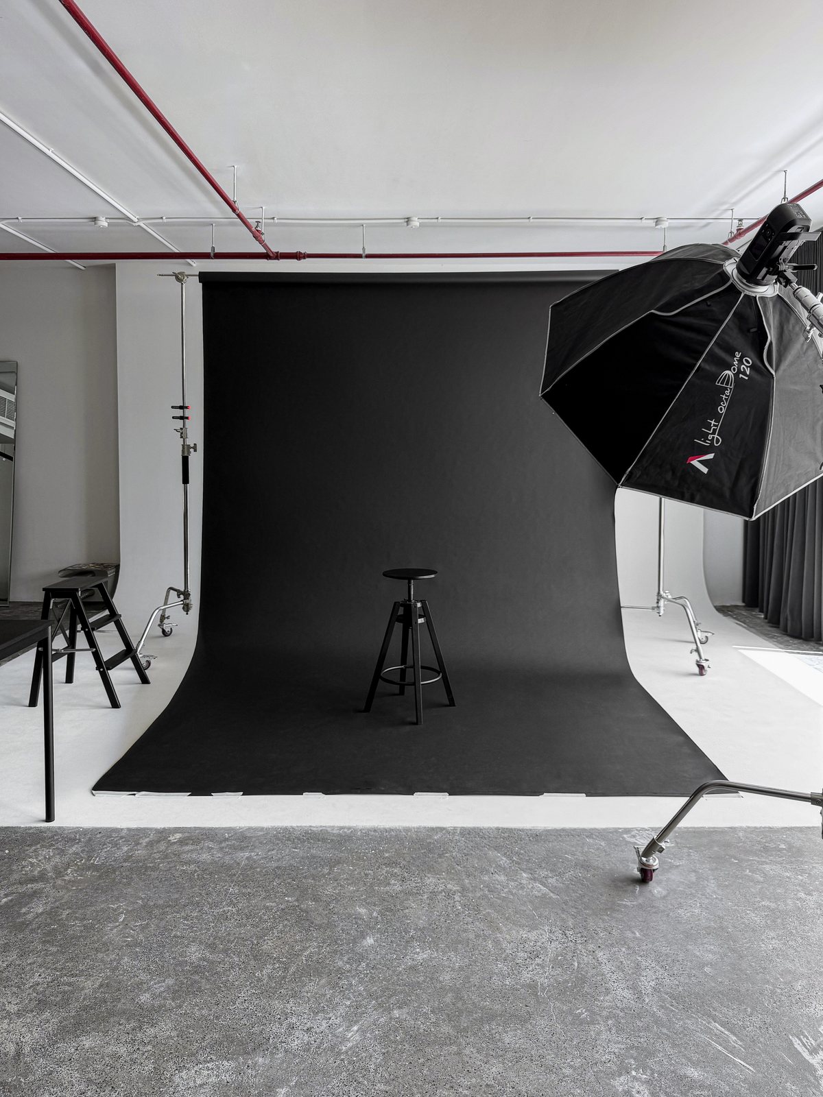 Black paper backdrop set up on the cyclorama